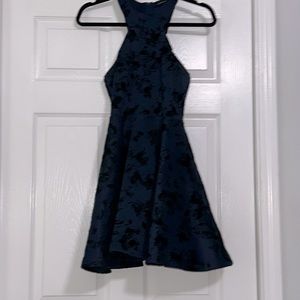 Navy dress with black flower accent print